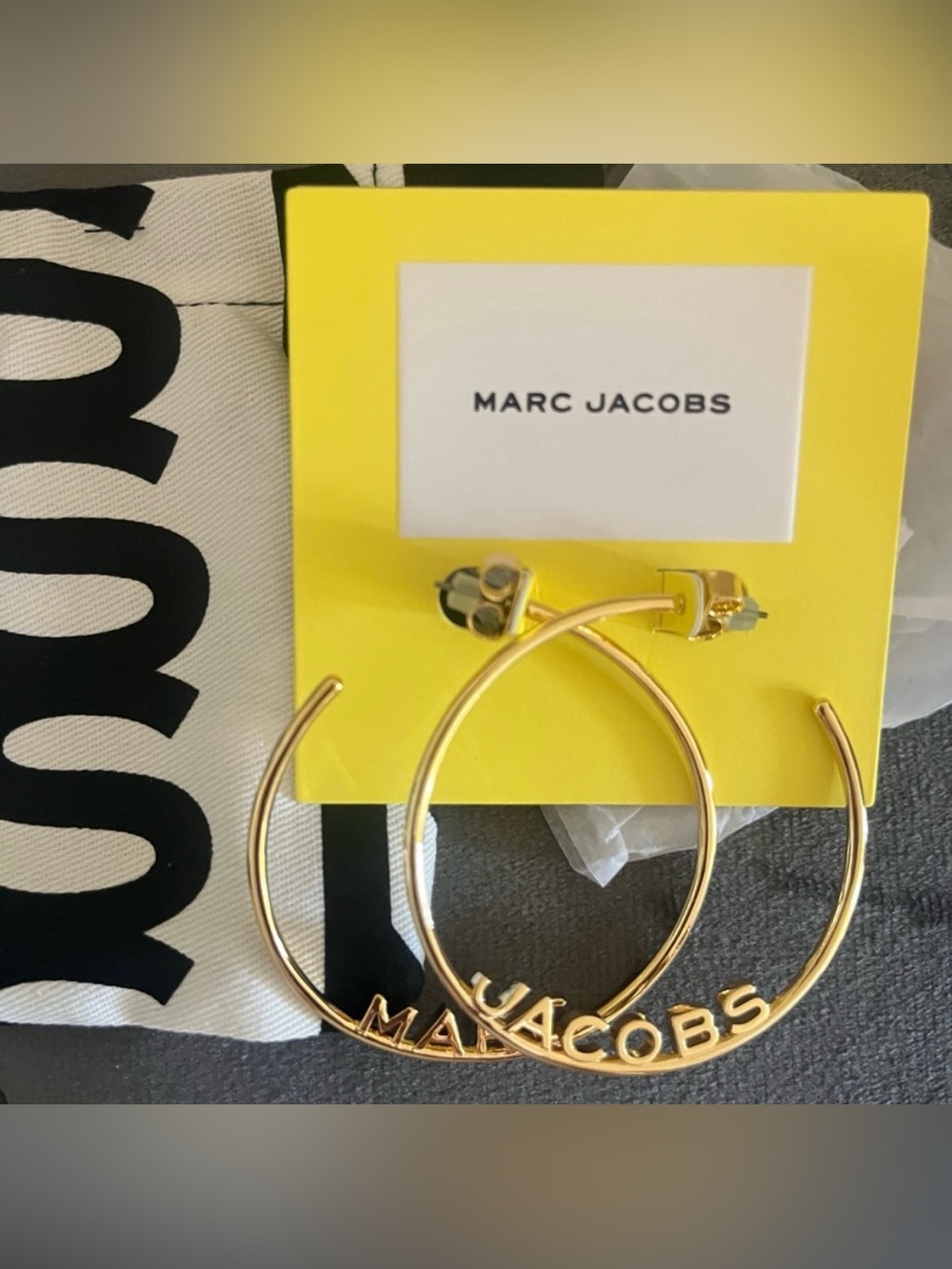 Marc Jacobs Monogram Hoop
Earrings in Gold.